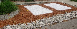 Dad's last piece of Art for the minimalist naturalist - pebbles, red crushed brick, river rock and white dolomite that was sprinkled with glittering penny size crystal quartz. Maybe, designed by Momma, but hard labor, Daddy .