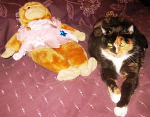 Brave Charlie now shares Momma's bed with a kitty's best friend Ruby, the Exquisite Stuffed Monkey.