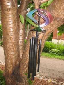 The wind chime not only tinkles in the breeze, its rainbow orbs of light, blind and frighten wildlife.