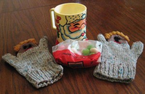 For real - the Christmas Mug (probably bought at the church bazaar, the open bag of pink, green and white mints and the puppet mits knit by Grandmama.