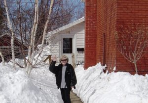 Trees buried in snowbank...Momma is happy...she is on her way inside!